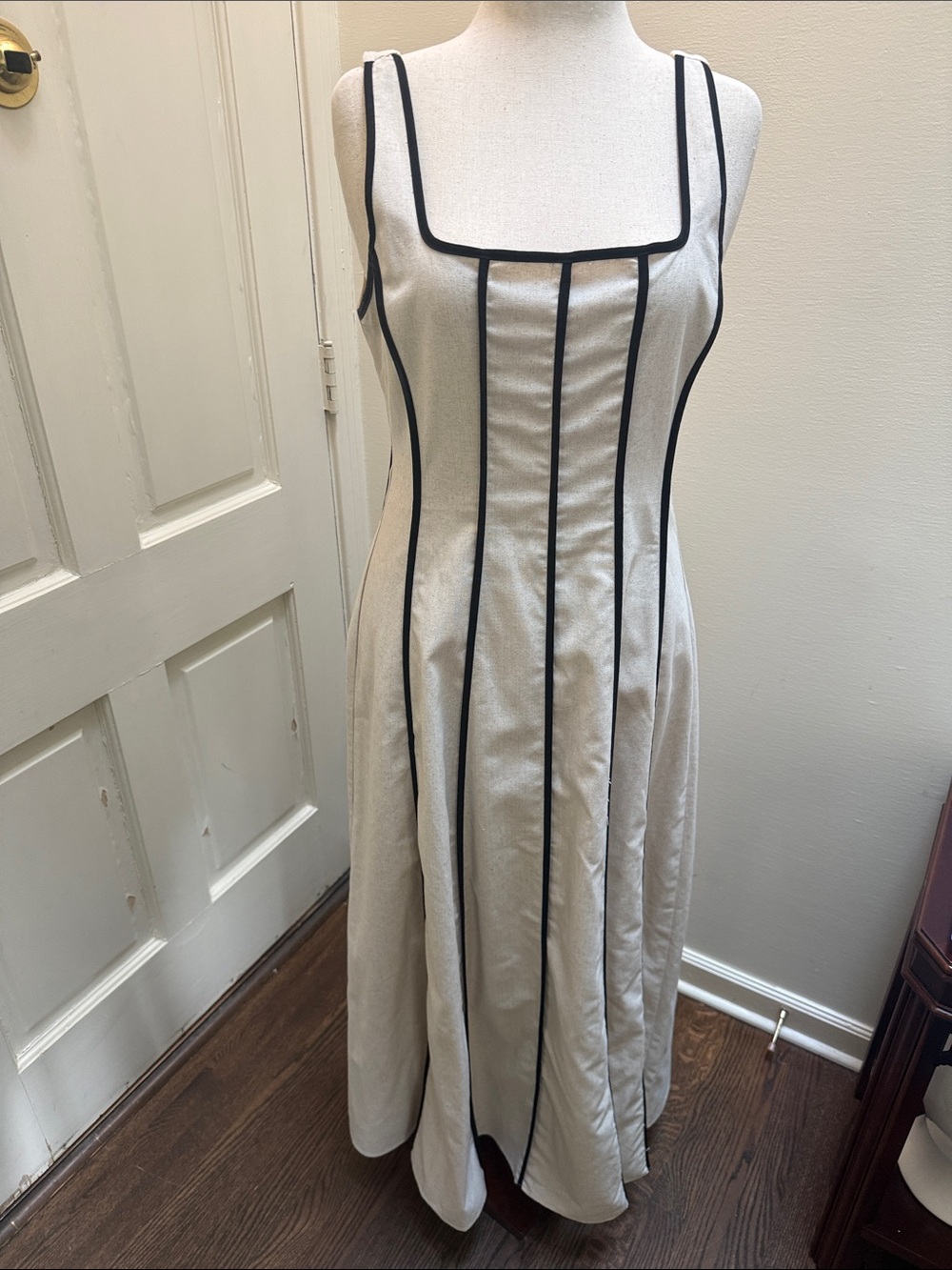 Sleeveless Cream Dress with Black Piping